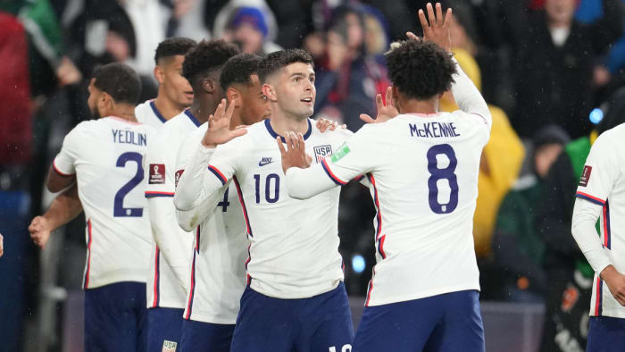 Christian Pulisic and Weston McKennie celebrate a USA goal vs. Mexico
